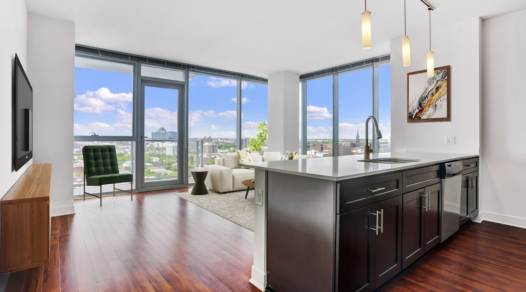 large living are with wood floors and large windows