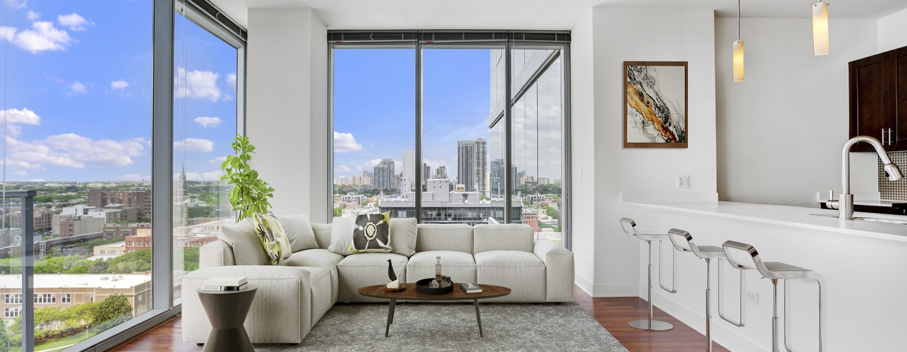 living room with couch and large windows