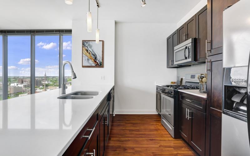 a kitchen with a large window