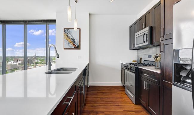 a kitchen with a large window