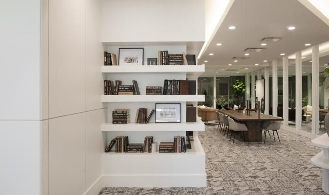 a room with a table and chairs