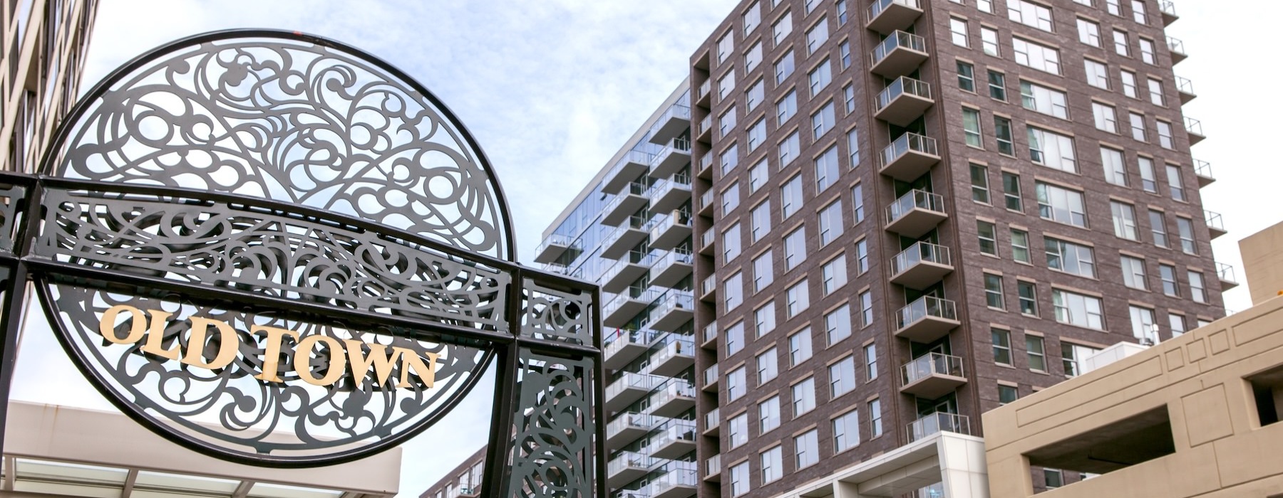 a sign and a tall building